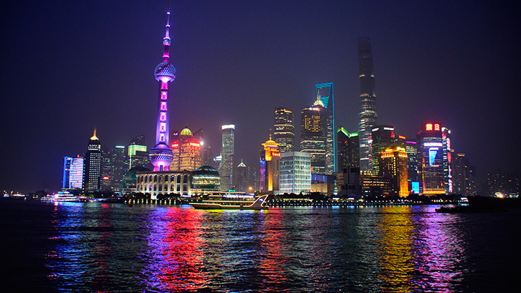 Night view along the Bund of the famed Shanghai skyline.